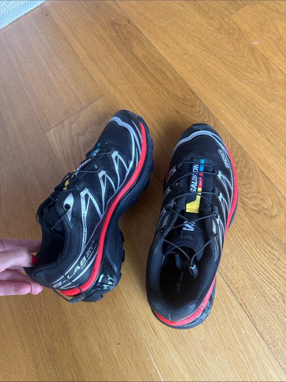 Salomon Black Sneakers with Red and Yellow Accents - Picture 3 of 3